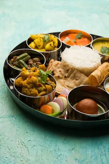 Different Indian cuisine in the Thali which is provided by one of the vegetarian restaurants Brampton.